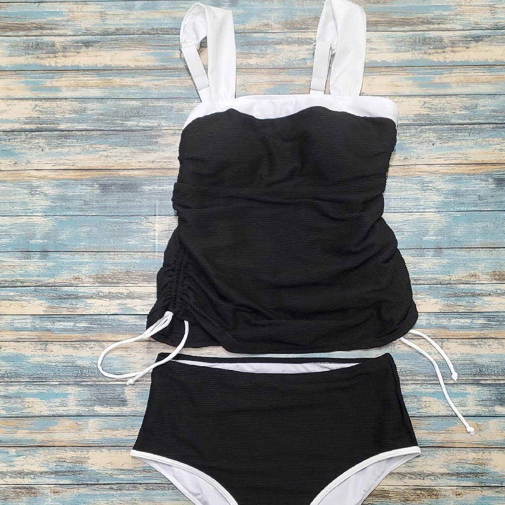 Chic Black and White Swimwear by [Brand]